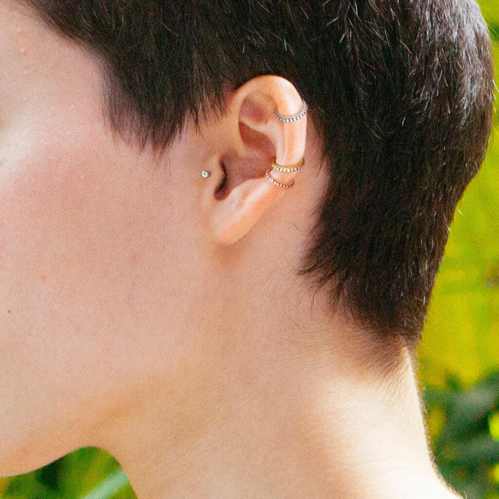 Lävistysrengas 1mm, Titanium Hinged Segment Hoop Ring with CZ in Gold