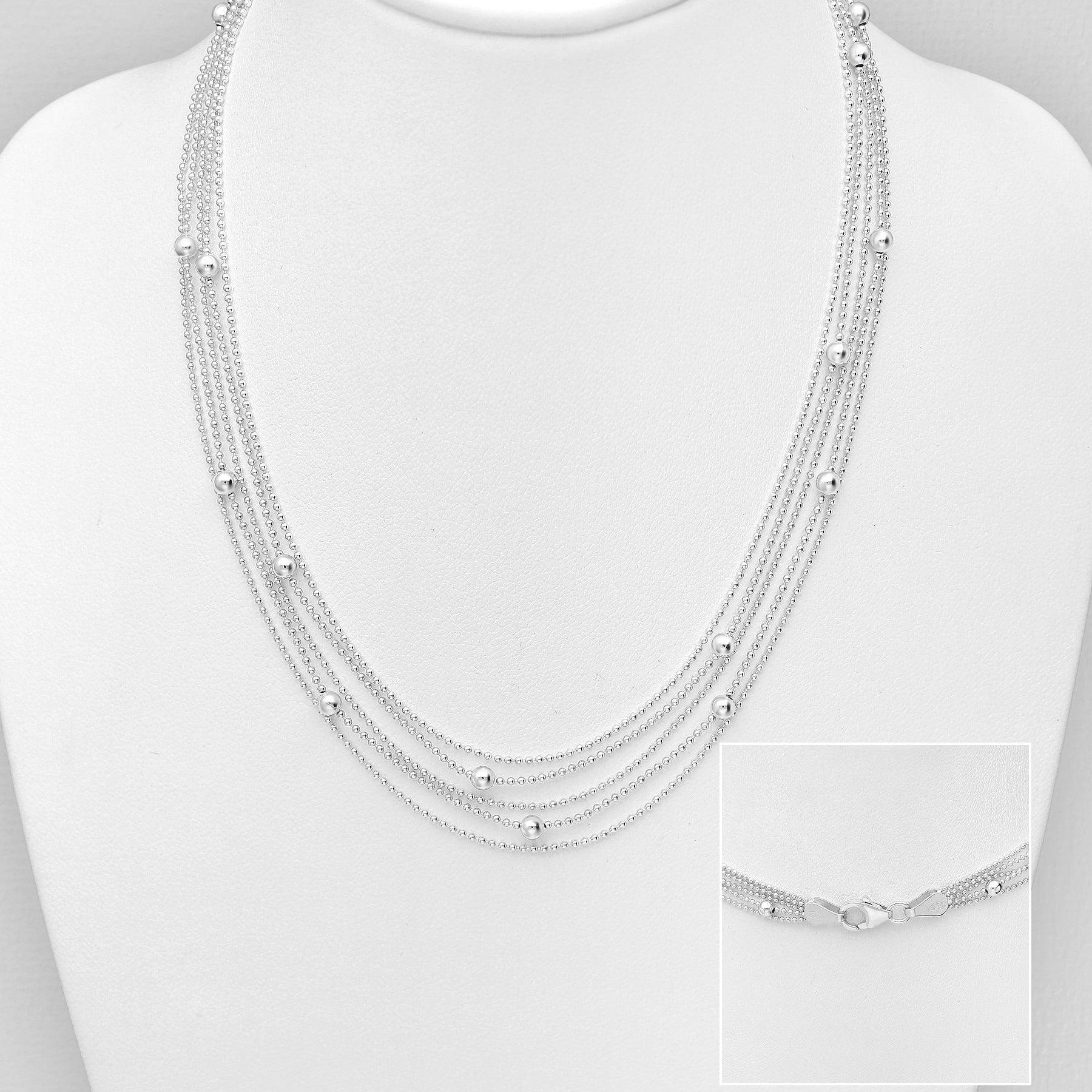 Monikerroksinen hopeakaulakoru sterling hopeaa.
