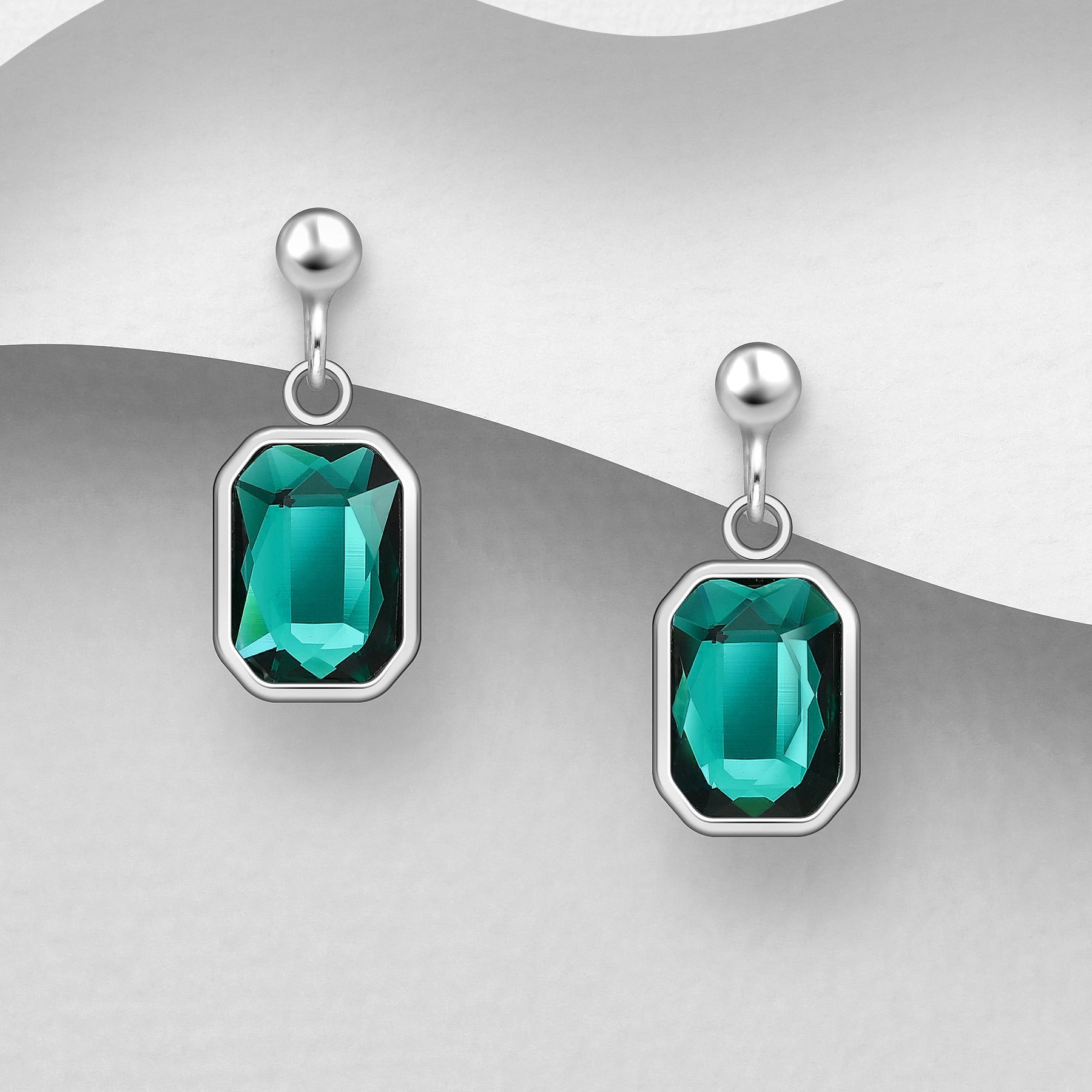 Smaragdinvihreät-hopeakorvakorut