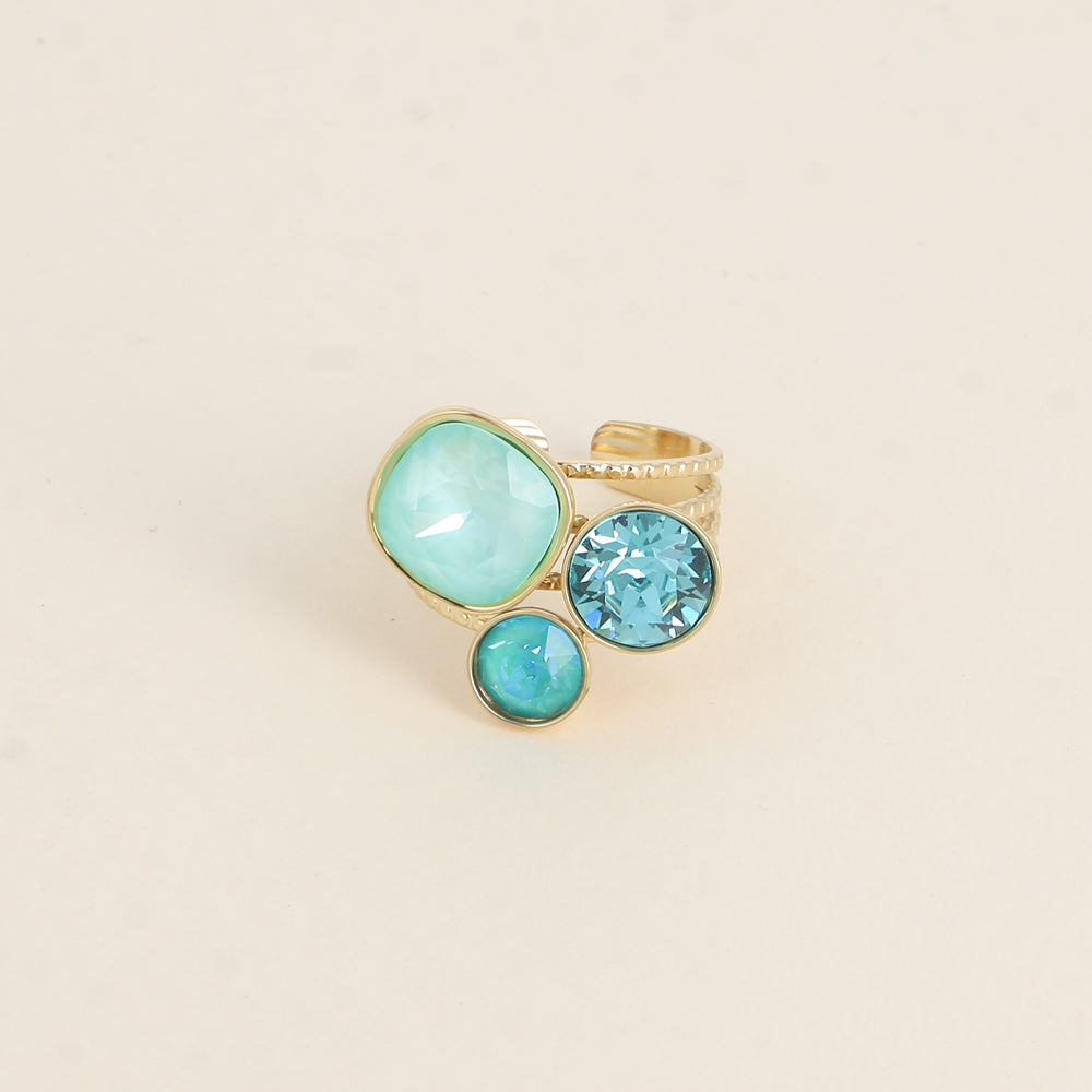 Bohm Paris säädettävä kristallisormus turkoosin ja mintun sävyissä.