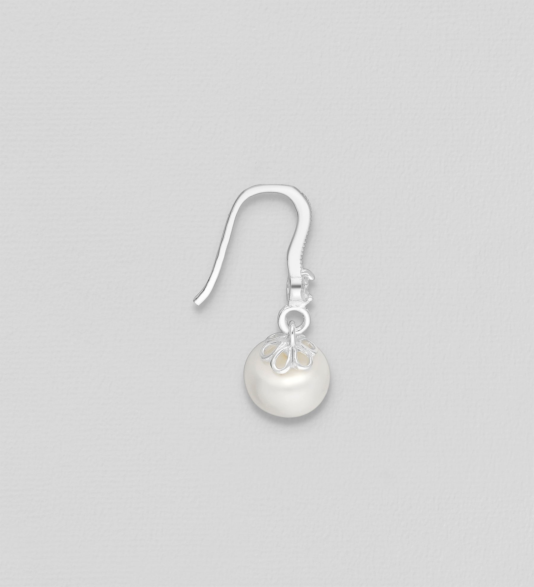 Sirot roikkuvat helmikorvakorut 925-hopeaa ja pienellä kristallilla.