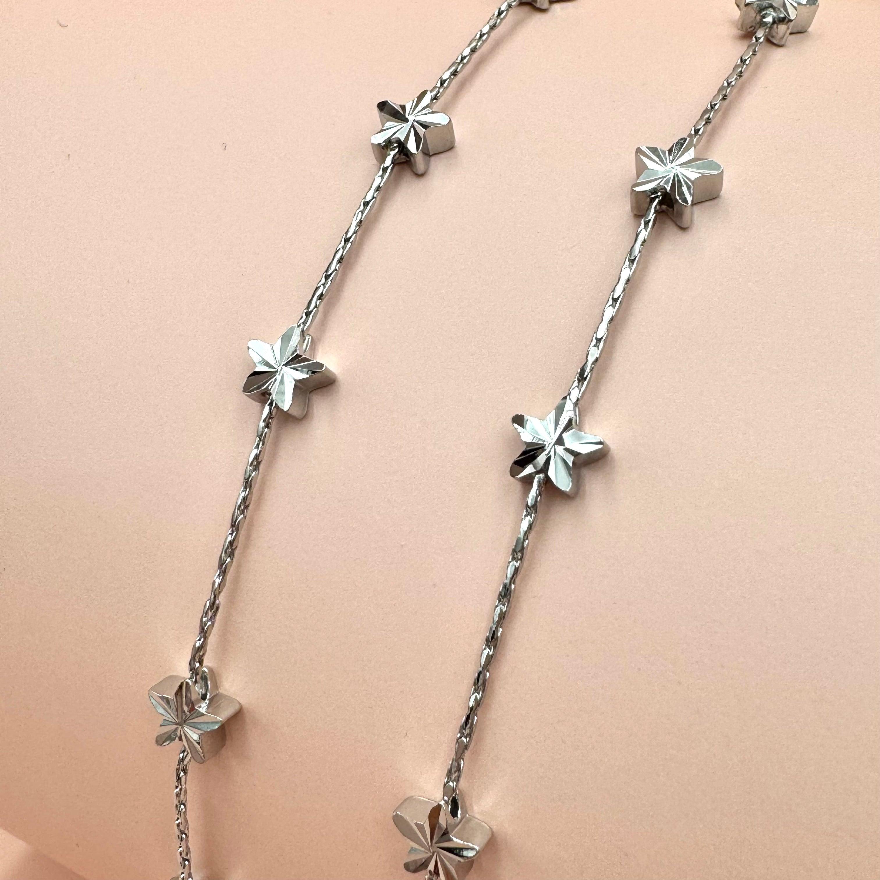 FRENCH RIVIERA | Étoile Earrings -pitkät tähtikorvakorut (hopea)