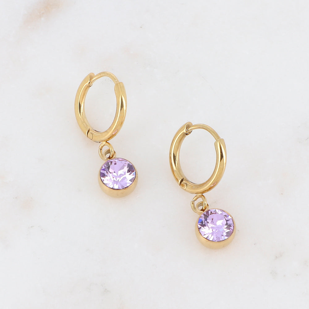 Kullanväriset korvakorut laventelinsävyisellä kristallilla