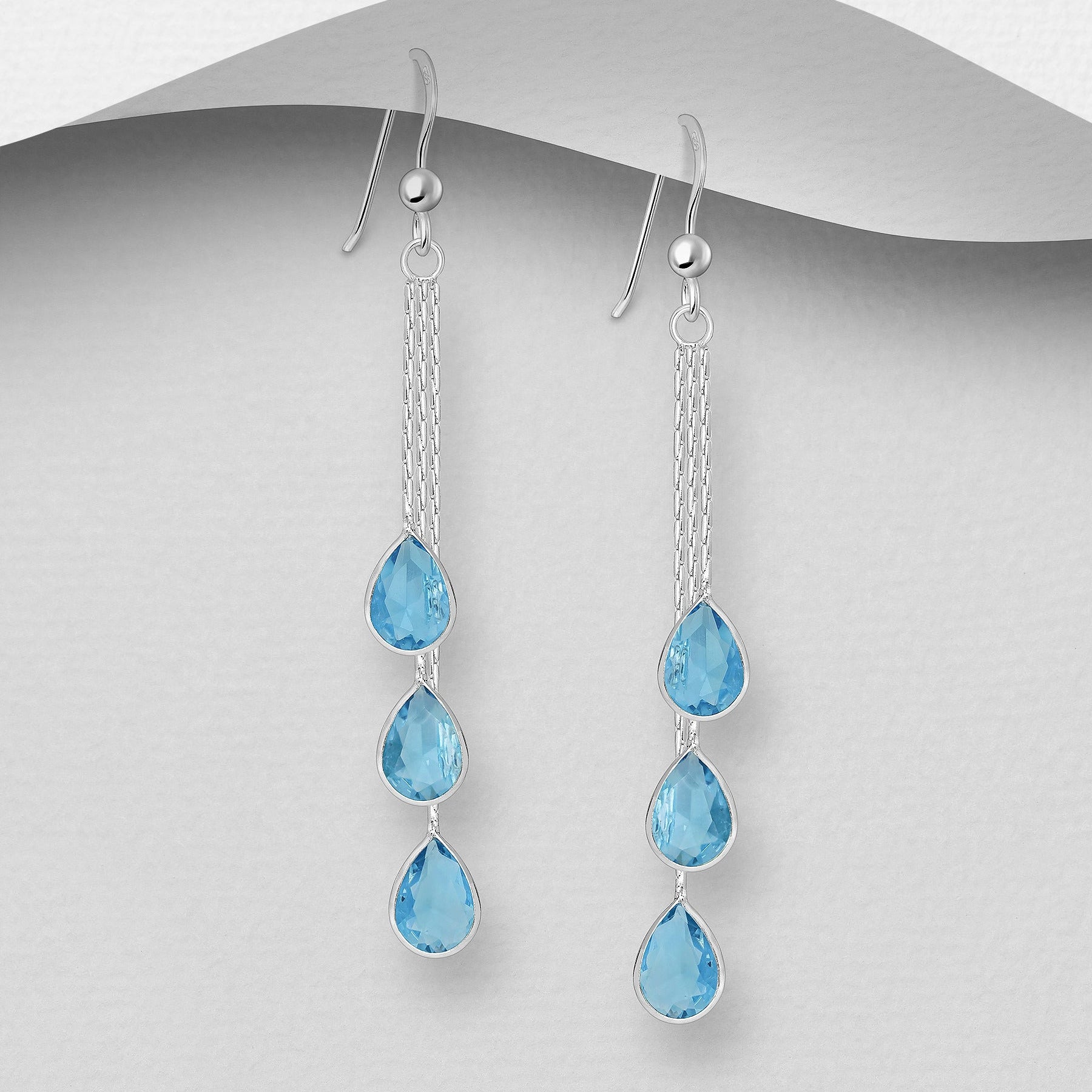 Felicia-hopeakorvakorut pitkällä ketjulla ja turkooseilla pisaranmuotoisilla CZ-kivillä, Sterling Hopea 925.