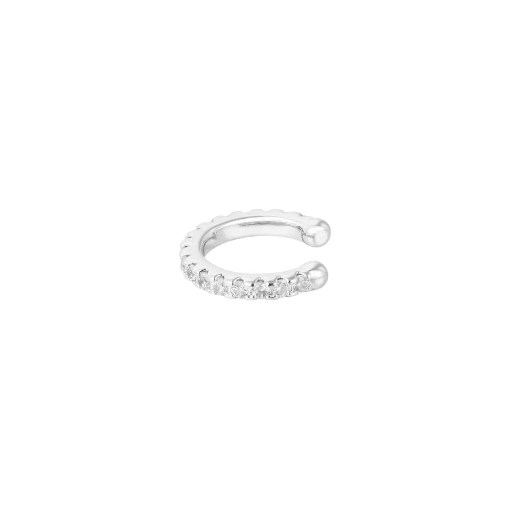 FRENCH RIVIERA Celeste hopeanvärinen ear cuff -korvakoru, jossa siro kaareva muotoilu ja yksi kirkas CZ-kristallirivi.