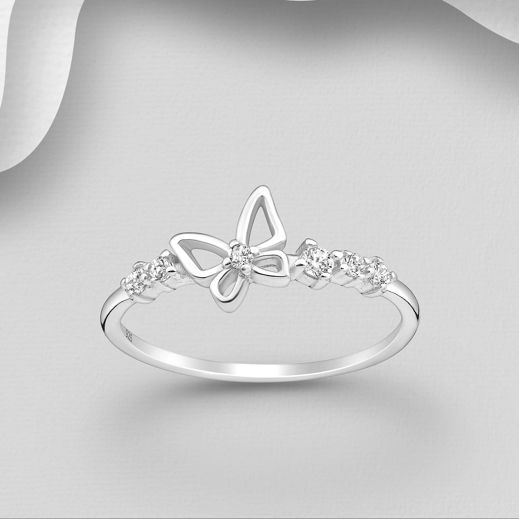 Hento hopeasormus, jossa perhoskoriste ja kirkkaat zirkoniat.