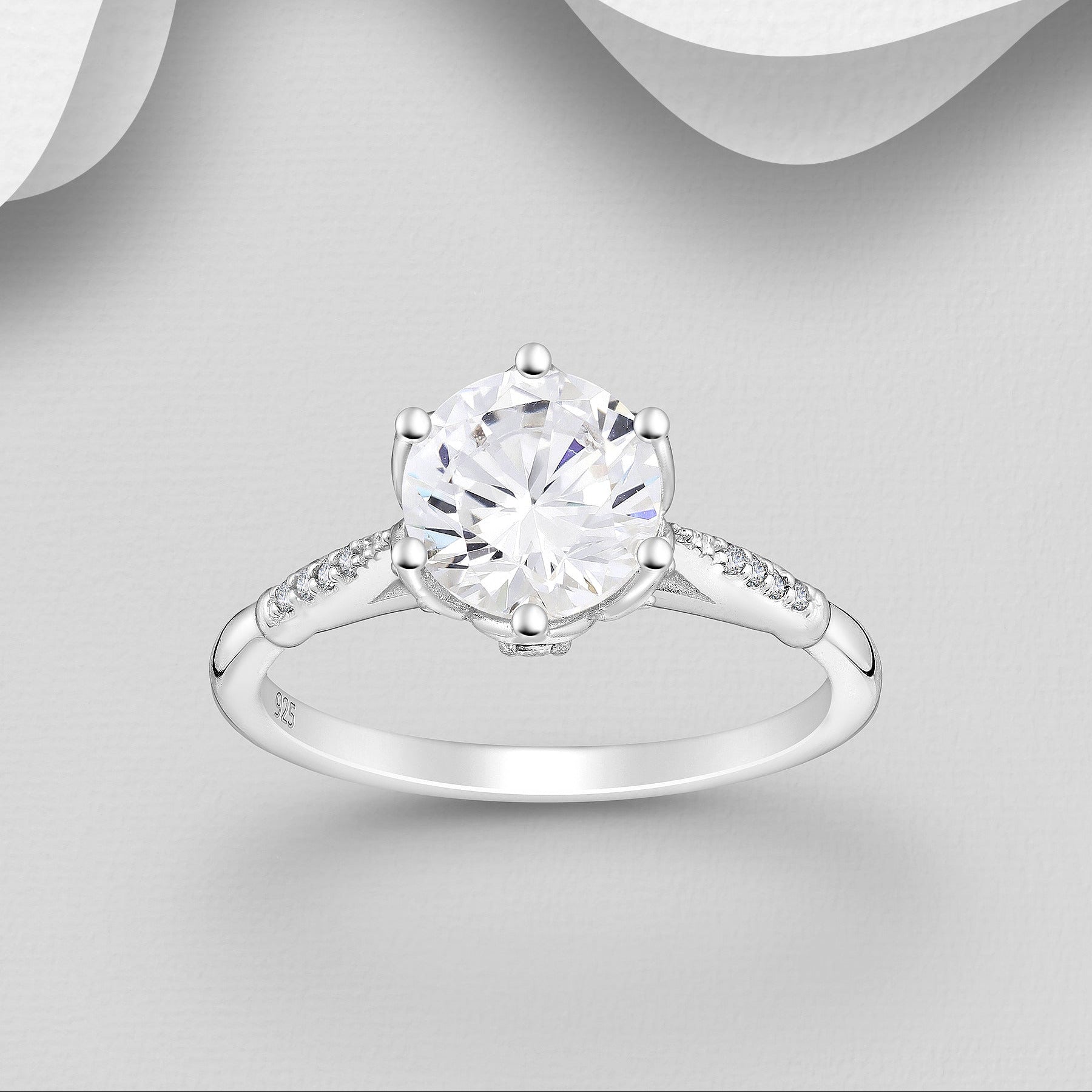 Evelynne halo-sormus 925 hopeaa – säihkyvä keskikivi ja romanttinen istutus.