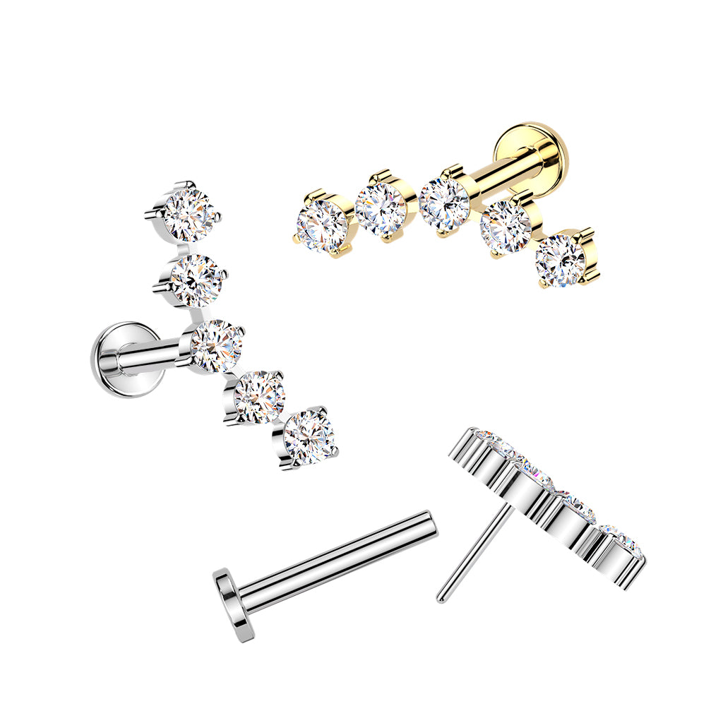 Stella Arc kulta- ja hopea rustokoru sivuprofiilissa, implanttitason titaani ja kirkkaat cubic zirconia -kivet.