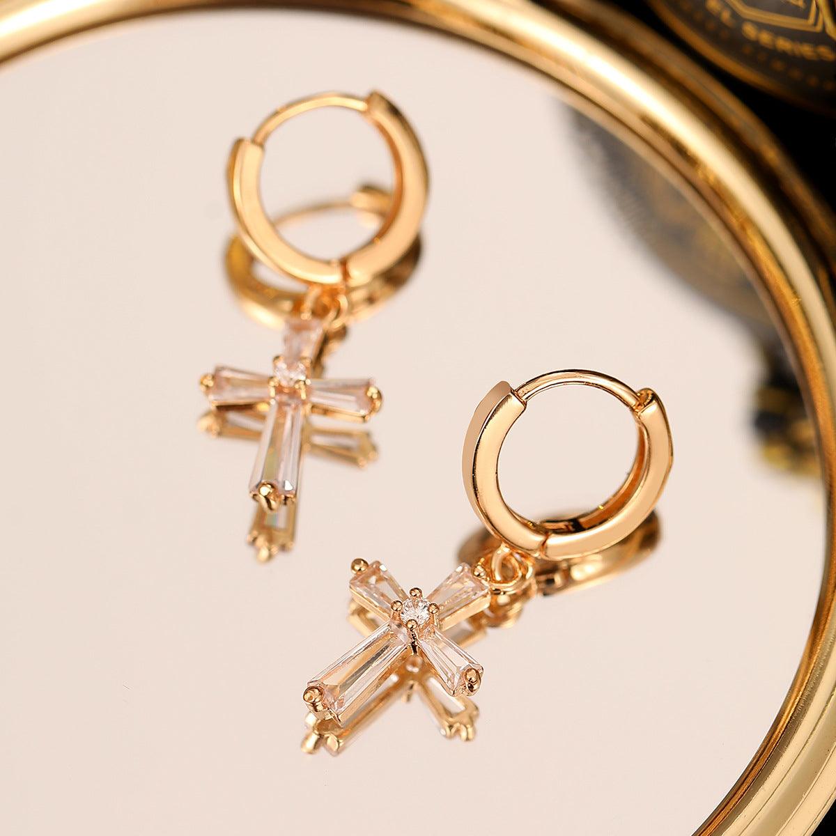 FRENCH RIVIERA | Glitter Cross -kullanväriset ristikorvakorut