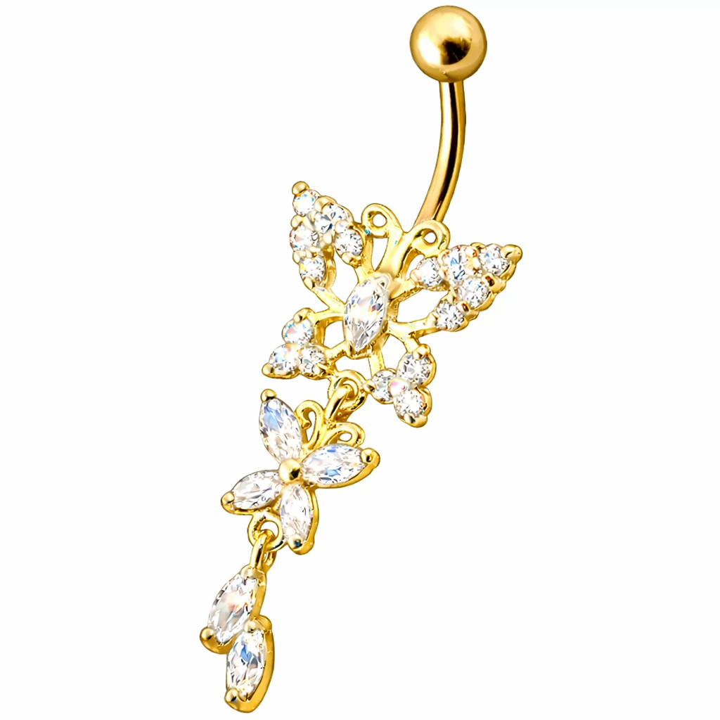 Kullattu Isla napakoru kukka- ja perhoskoristeella valkoista taustaa vasten.