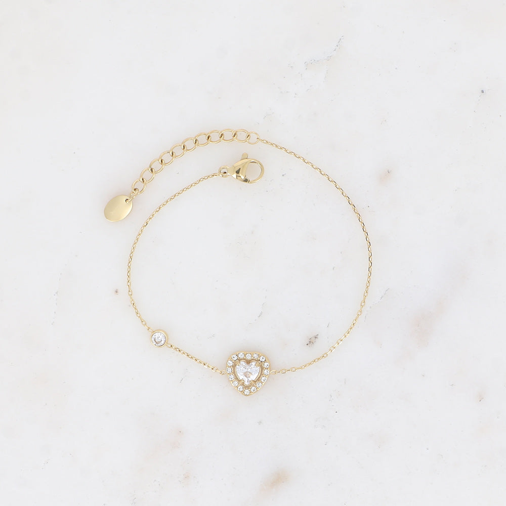 Kultainen kirurginteräsrannekoru, jossa säihkyvä kristallisydän ja siro ketju, Bohm Paris.