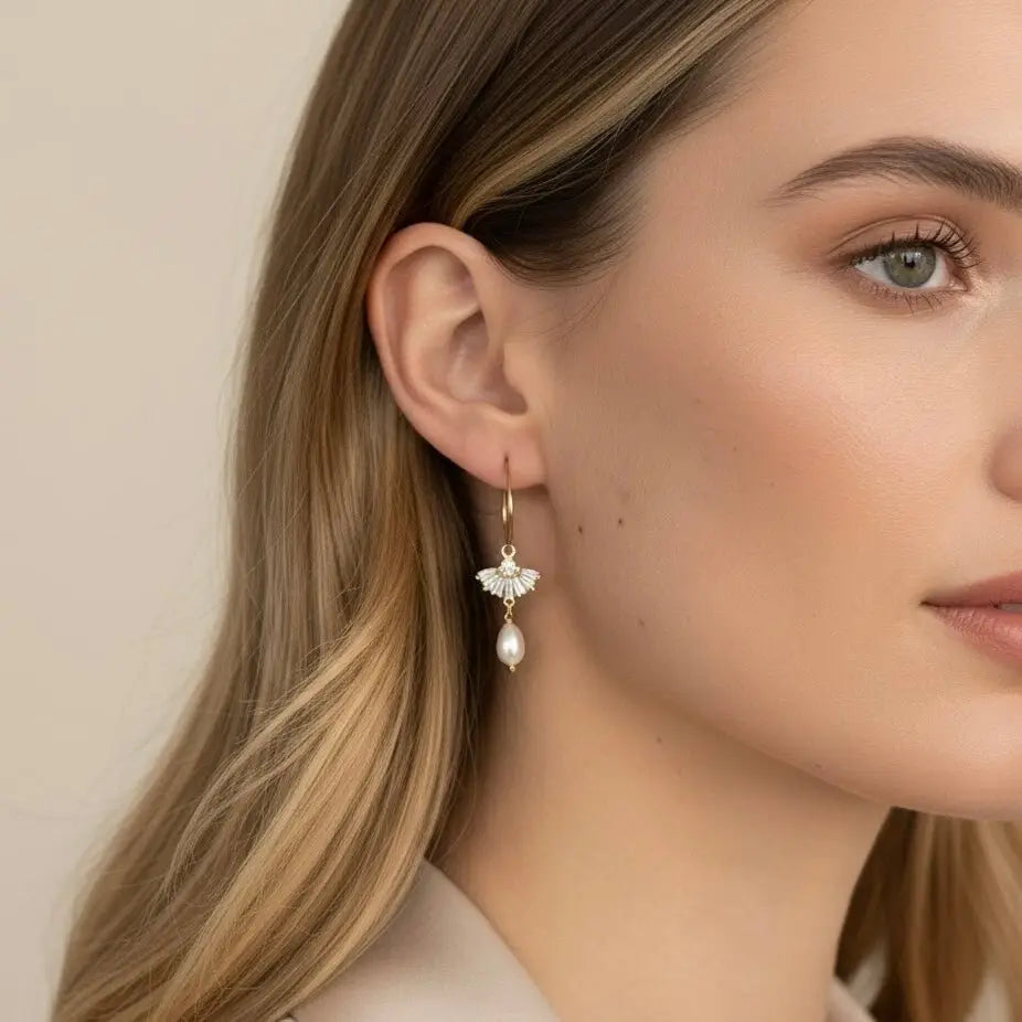 Elegantit italialaiset juhlakorvakorut mallin korvissa