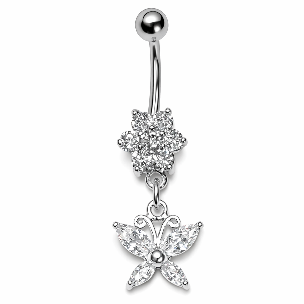 Titaaninen Belisse napakoru kukka- ja perhoskoristeella valkoista taustaa vasten.