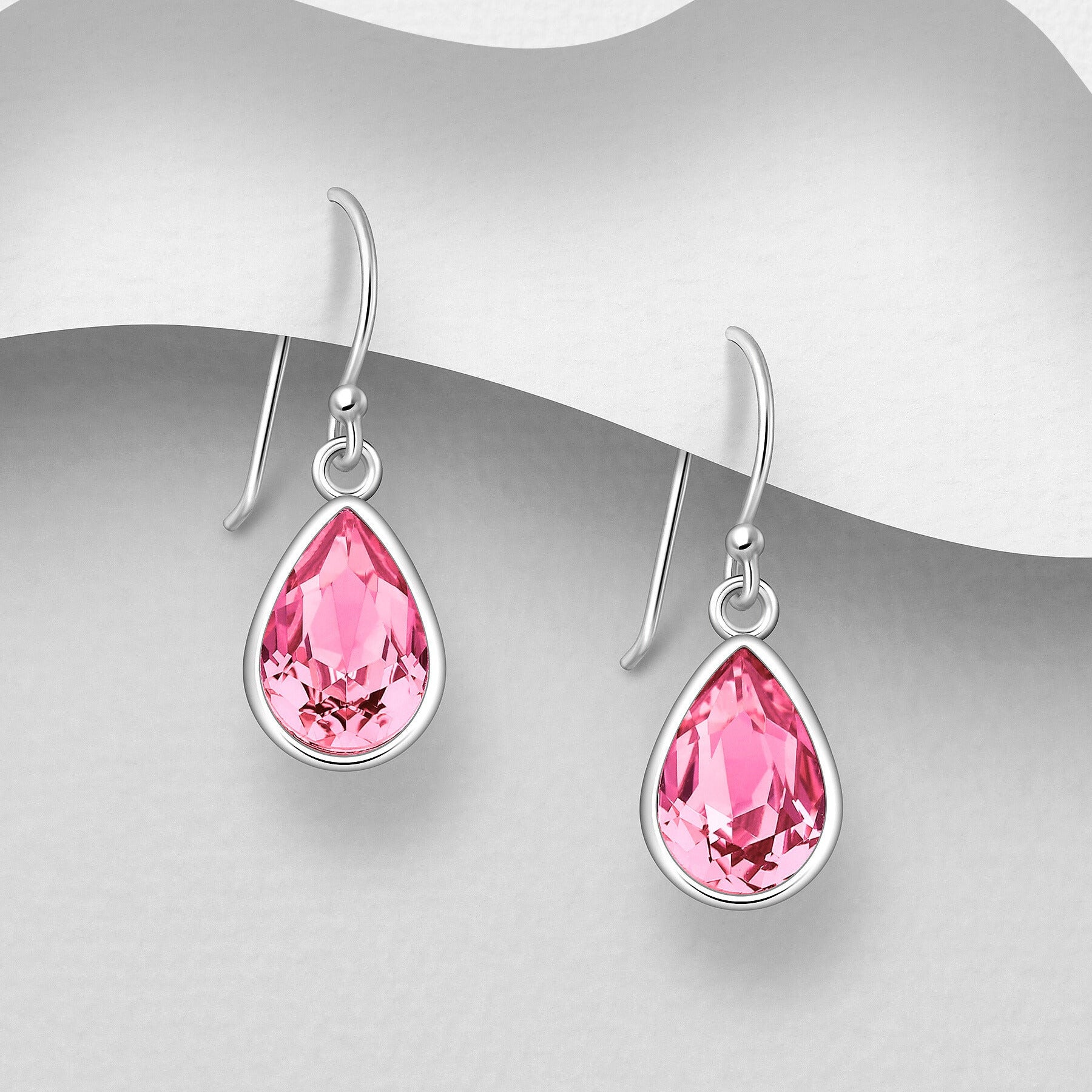 Sirot vaaleanpunaiset pisarahopeakorvakorut kevyellä koukkukiinnityksellä.